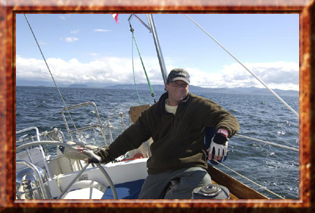 captain Keith at the helm